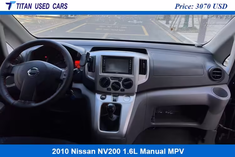 center console of the 2010 Nissan NV200 Used Car